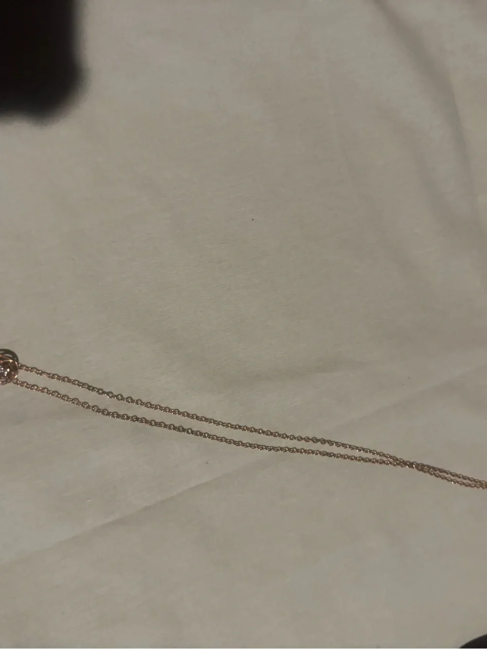 Gold chain with gold charm. Green and clear stones! Beautiful piece!